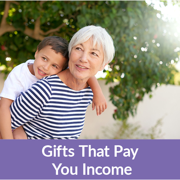 A woman holding her grandchild. Gifts That Pay You Income Rollover A woman holding her grandchild. Gifts That Pay You Income Rollover